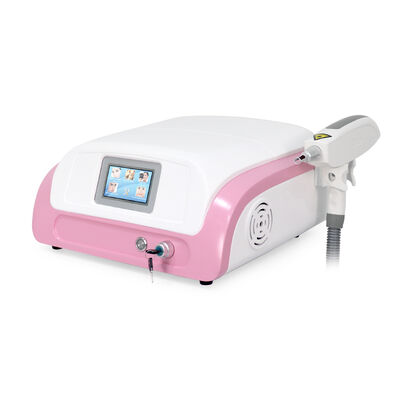 Macchina laser ND YAG per la rimozione dei tatuaggi, macchina per la bellezza. Dispositivo laser per la bellezza piccolo e portatile, rimozione laser dei tatuaggi.