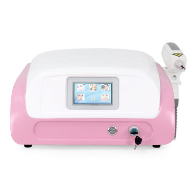 Macchina laser ND YAG per la rimozione dei tatuaggi, macchina per la bellezza. Dispositivo laser per la bellezza piccolo e portatile, rimozione laser dei tatuaggi.