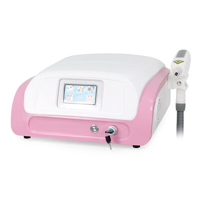 Macchina laser ND YAG per la rimozione dei tatuaggi, macchina per la bellezza. Dispositivo laser per la bellezza piccolo e portatile, rimozione laser dei tatuaggi.
